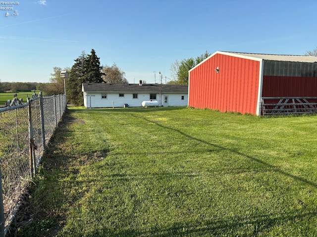 6814 Parker Rd, Castalia, OH 44824 - view of yard with fence and an outbuilding