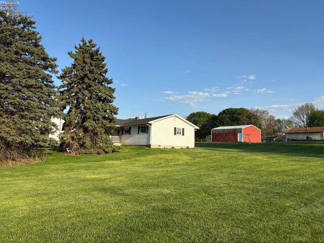 6814 Parker Rd, Castalia, OH 44824 - view of yard featuring an outbuilding