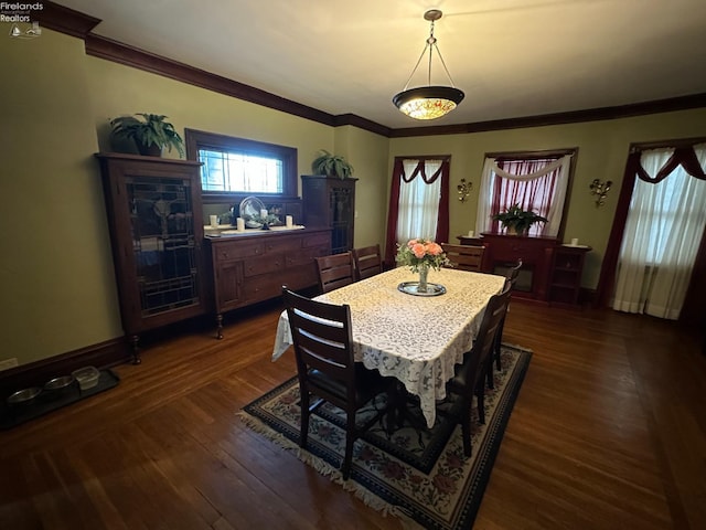123 E Main, Norwalk, OH 44857 - dining room with ornamental molding and dark wood-style flooring