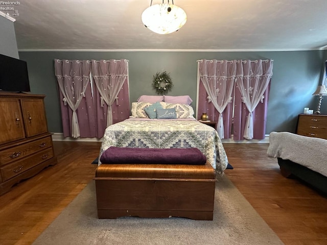 123 E Main, Norwalk, OH 44857 - bedroom featuring crown molding and wood finished floors