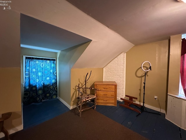 123 E Main, Norwalk, OH 44857 - workout area with hardwood / wood-style floors, baseboards, and vaulted ceiling