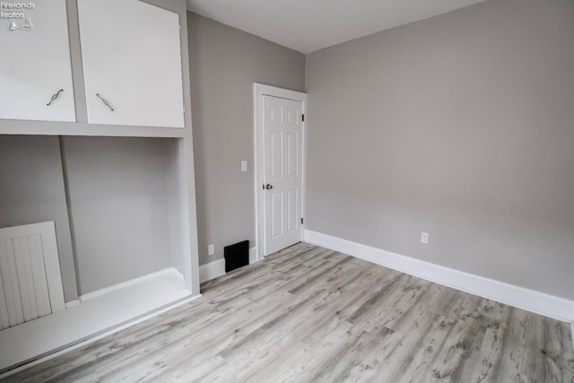 2615 Columbus Ave, Sandusky, OH 44870 - unfurnished room featuring light wood-style flooring and baseboards