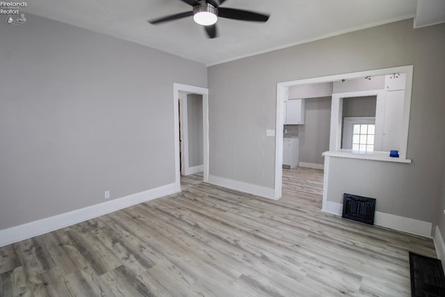 2615 Columbus Ave, Sandusky, OH 44870 - interior space featuring visible vents, light wood-style flooring, and baseboards