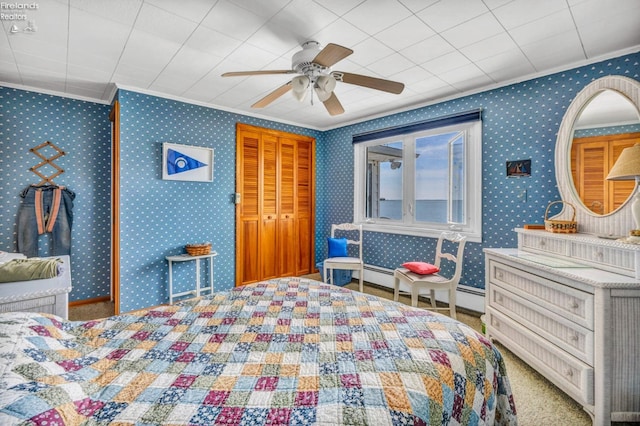 1270 Deist Rd, Middle Bass Island, OH 43446 - bedroom featuring ornamental molding, a baseboard heating unit, and ceiling fan