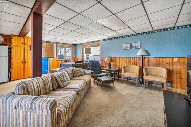 1270 Deist Rd, Middle Bass Island, OH 43446 - carpeted living area with a paneled ceiling, wallpapered walls, wainscoting, and wood walls