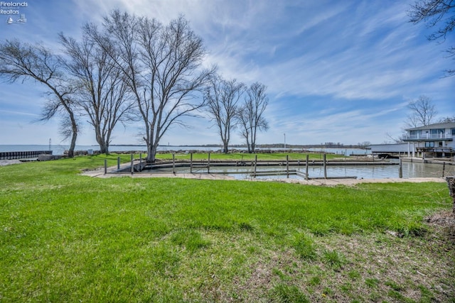 1270 Deist Rd, Middle Bass Island, OH 43446 - view of yard with a dock and a water view