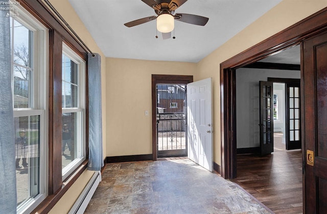1507 S Lakeview Blvd, Lorain, OH 44052 - interior space with a baseboard heating unit and plenty of natural light