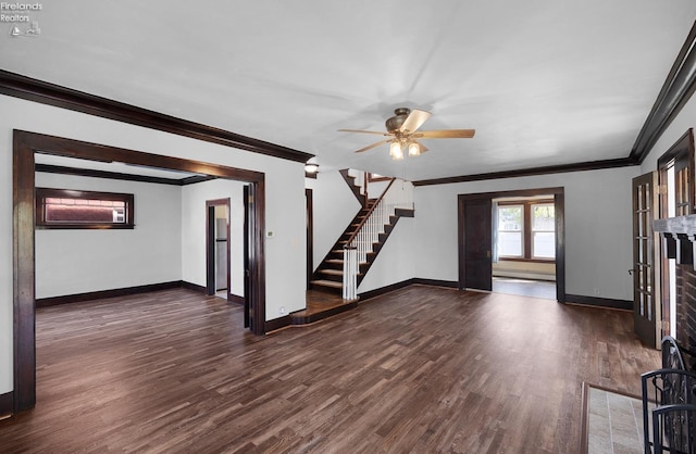 1507 S Lakeview Blvd, Lorain, OH 44052 - unfurnished living room featuring stairway, ornamental molding, and wood finished floors