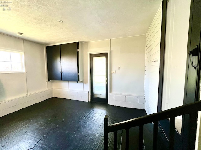 120 Mckim St, Bellevue, OH 44811 - unfurnished room featuring a textured ceiling