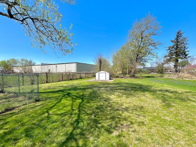 120 Mckim St, Bellevue, OH 44811 - view of yard with an outdoor structure, a storage shed, and fence