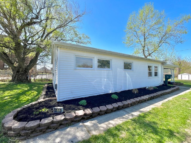 120 Mckim St, Bellevue, OH 44811 - view of side of property with a yard