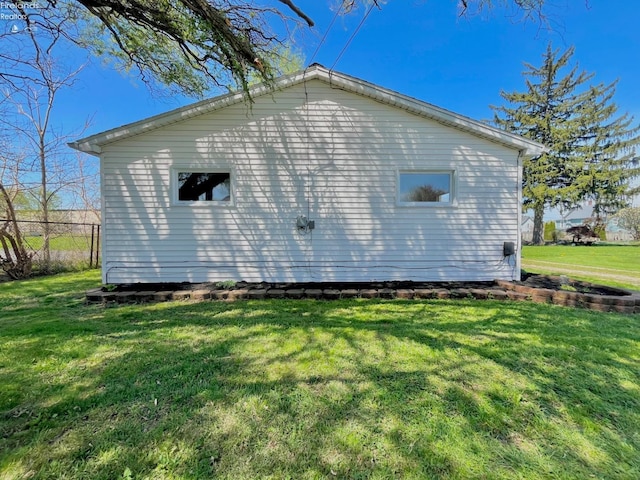 120 Mckim St, Bellevue, OH 44811 - view of property exterior featuring a yard