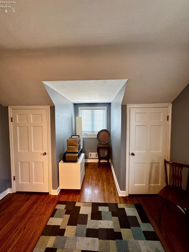 5106 Ottawa River Rd, Toledo, OH 43611 - additional living space with wood finished floors, visible vents, and baseboards