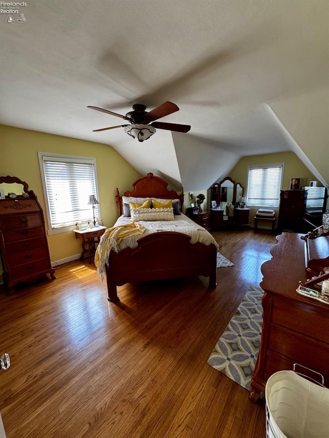 5106 Ottawa River Rd, Toledo, OH 43611 - bedroom with wood finished floors, multiple windows, and lofted ceiling