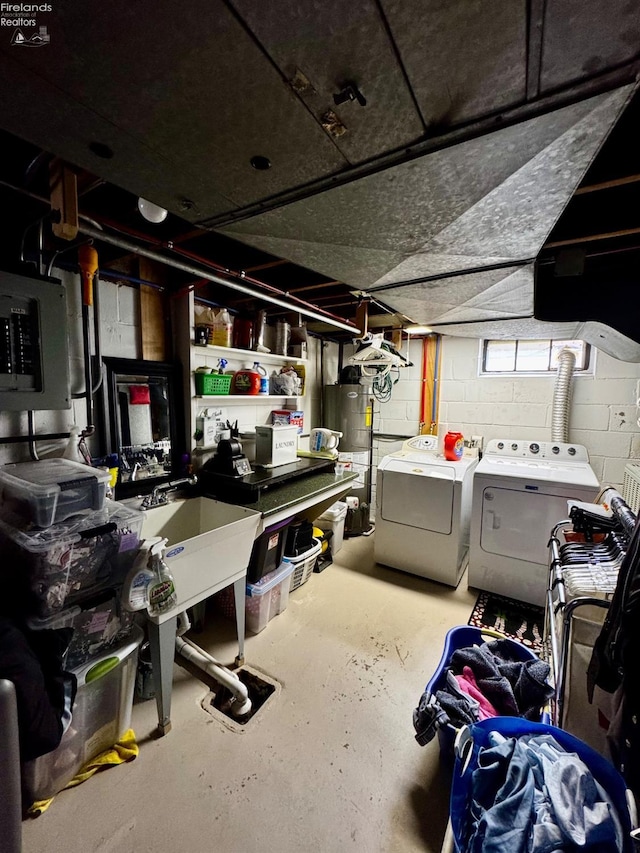 5106 Ottawa River Rd, Toledo, OH 43611 - below grade area featuring concrete block wall, washer and dryer, and gas water heater
