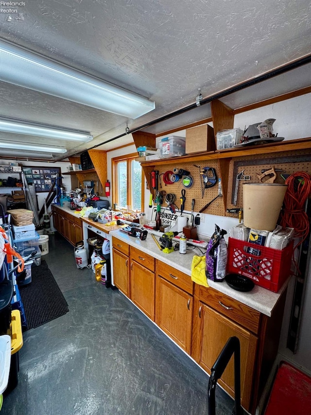 5106 Ottawa River Rd, Toledo, OH 43611 - interior space with a textured ceiling, a workshop area, and concrete floors