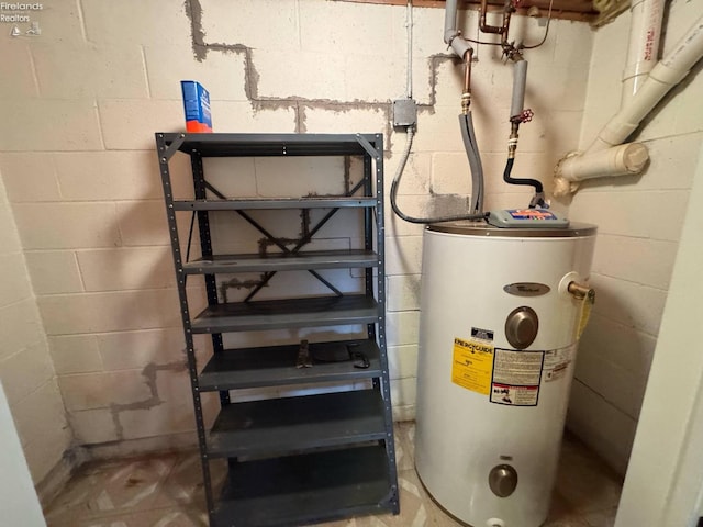 utility room with water heater