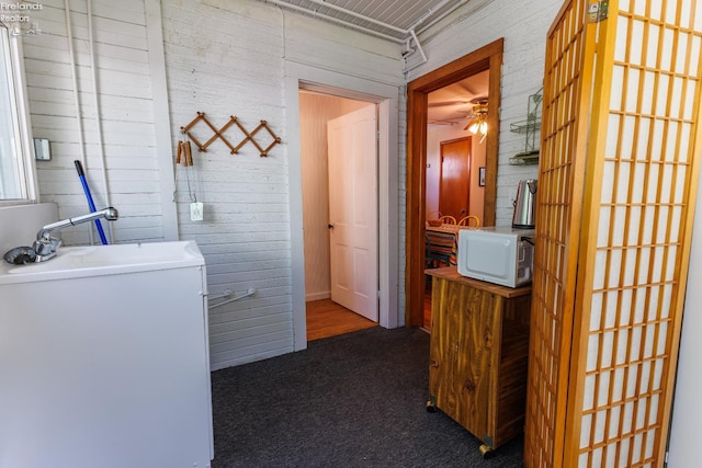 428 Cedar, Lakeside, OH 43440 - corridor with carpet flooring and a sink