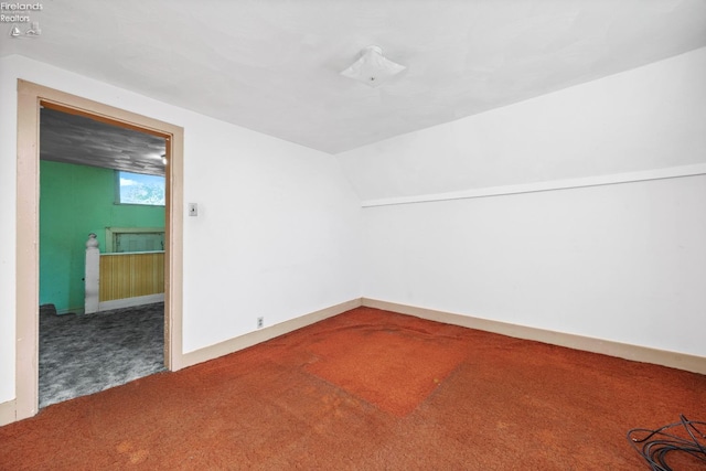 interior space featuring vaulted ceiling