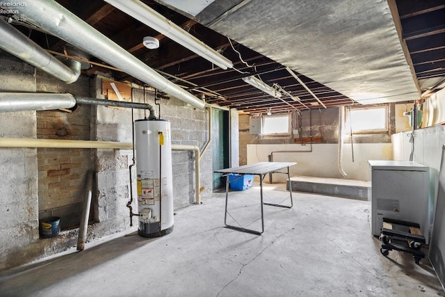 basement featuring water heater