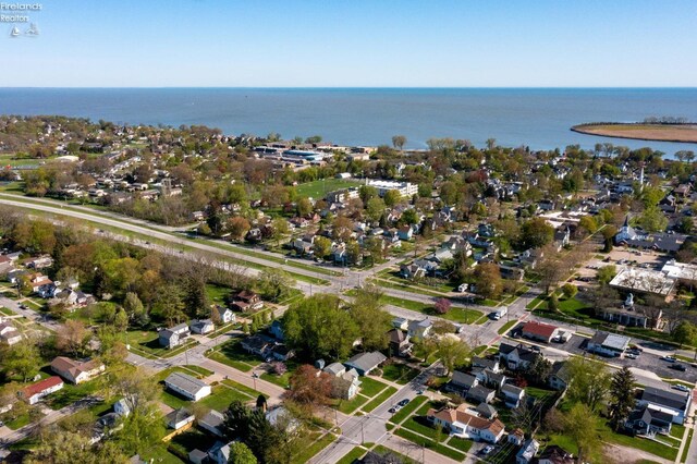 aerial view featuring a water view and a residential view