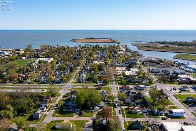 aerial view with a residential view and a water view
