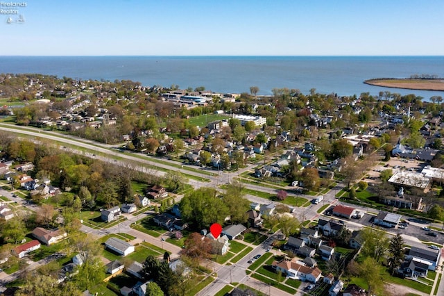 aerial view with a water view and a residential view