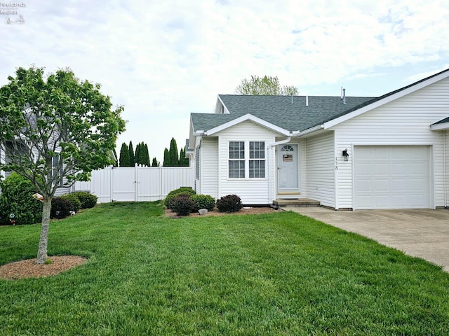 ranch-style house featuring a garage, a front lawn, fence, roof with shingles, and driveway