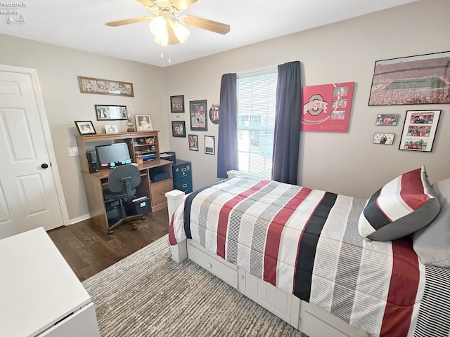 173 Excalibur Dr, Clyde, OH 43410 - bedroom with dark wood-style floors, an office area, and a ceiling fan