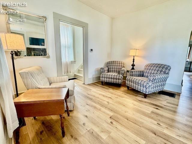 1026 Claremont Ave, Ashland, OH 44805 - sitting room with wood finished floors and stairway