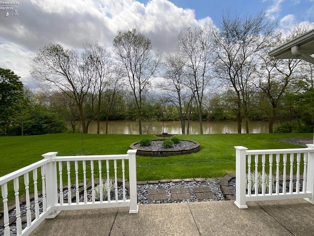 view of yard with a water view