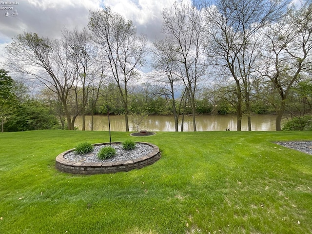 view of yard with a water view