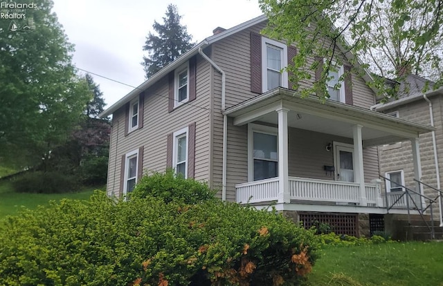 view of home's exterior with a porch
