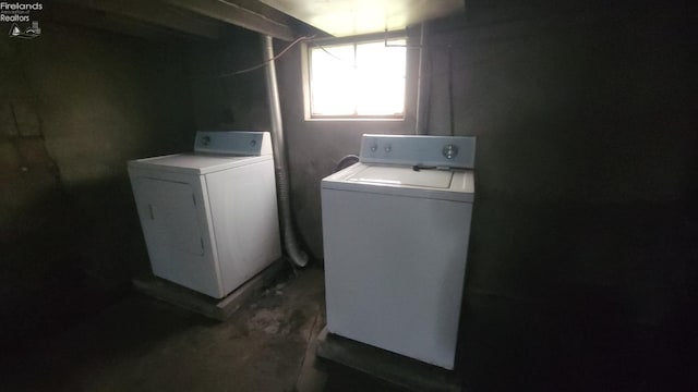 laundry room featuring washing machine and clothes dryer and laundry area