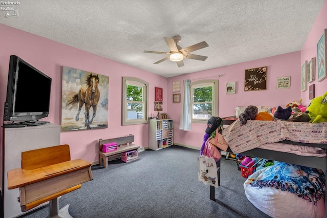 1733 County Road 302, Bellevue, OH 44811 - bedroom with a textured ceiling, carpet, ceiling fan, and baseboards
