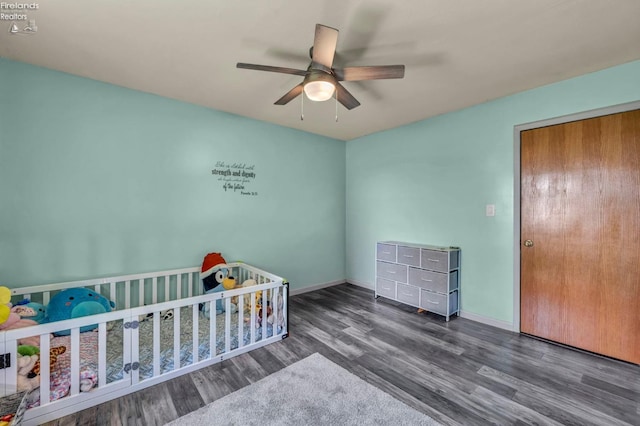 1733 County Road 302, Bellevue, OH 44811 - bedroom with wood finished floors, ceiling fan, and baseboards