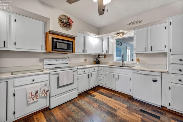 1733 County Road 302, Bellevue, OH 44811 - kitchen featuring white appliances, a sink, a ceiling fan, light countertops, and white cabinetry