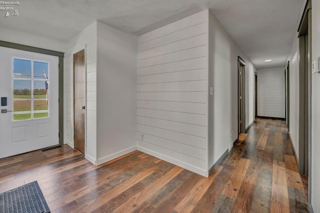 1733 County Road 302, Bellevue, OH 44811 - foyer featuring dark wood finished floors and baseboards