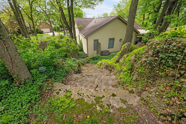 3535 E High Point Ln, Port Clinton, OH 43452 - view of home's exterior with roof with shingles