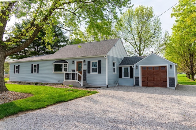5033 Crestline Rd, Bucyrus, OH 44820 - single story home featuring an attached garage, a shingled roof, driveway, and a front lawn