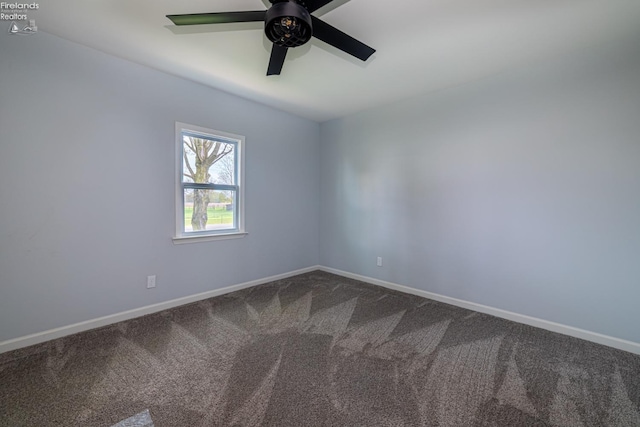 5033 Crestline Rd, Bucyrus, OH 44820 - spare room featuring baseboards, dark colored carpet, and ceiling fan
