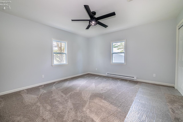 5033 Crestline Rd, Bucyrus, OH 44820 - unfurnished room with baseboards, baseboard heating, ceiling fan, and carpet floors