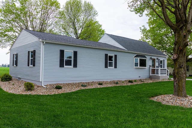 5033 Crestline Rd, Bucyrus, OH 44820 - exterior space with a yard and a shingled roof