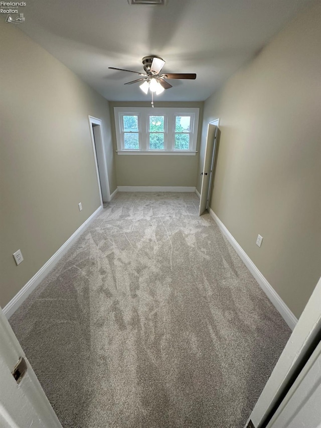 141 Main St, Castalia, OH 44824 - carpeted spare room featuring baseboards, visible vents, and ceiling fan