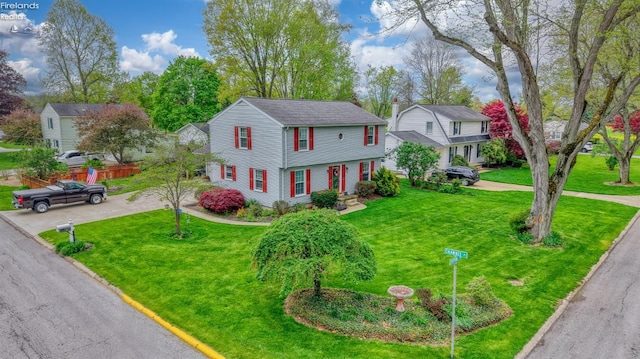 20 Chippewa Dr, Milan, OH 44846 - colonial-style house with driveway and a front yard