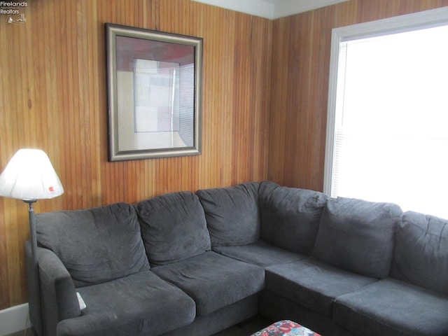 604 E Jefferson St, Sandusky, OH 44870 - living room with healthy amount of natural light and wooden walls