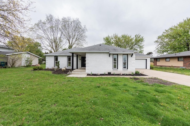 412 E 10th St, Port Clinton, OH 43452 - ranch-style house with driveway, a front yard, brick siding, and an outdoor structure