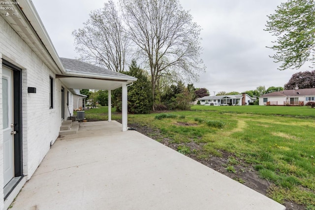 412 E 10th St, Port Clinton, OH 43452 - view of green lawn featuring a patio and cooling unit