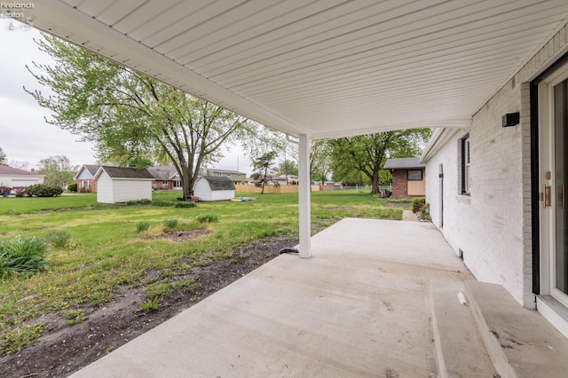412 E 10th St, Port Clinton, OH 43452 - view of patio / terrace with an outdoor structure and a shed