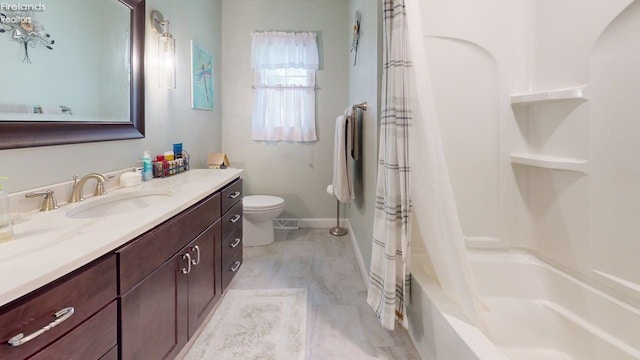 66 Hillcrest Dr, Willard, OH 44890 - full bath with toilet, vanity, shower / bath combination with curtain, and baseboards
